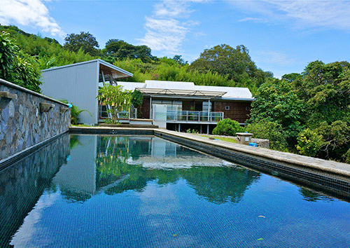 Contemporary one-level home for sale with private pool and panoramic views