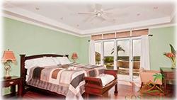 costa rica ranch, wooden staircase into the forest, gated entryway, Ocean views