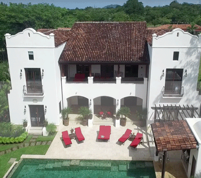 Show Stopping Hacienda Style Luxury Home in Beachfront and Golf Community