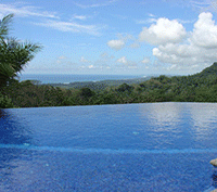 More Than 100 Acres of Coastal Mountain Land with Reserve, Horse Stables and Private Home