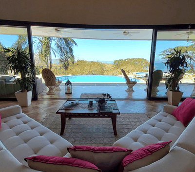 Elegant Coastal Villa with Infinity Pool and Lush Gardens