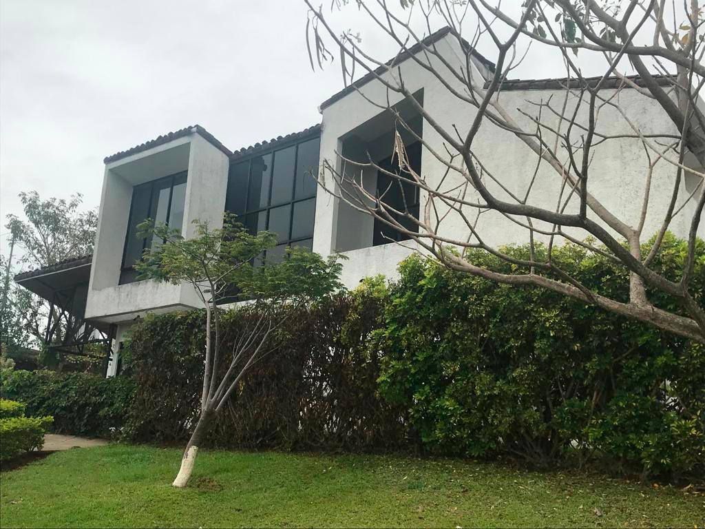 Industrial architectural style home with views to the mountains and city in a sought after gated community in Barreal, Heredia