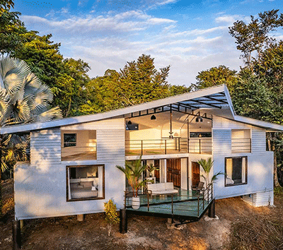 Tropical Elegance: Two-Level Home with Loft & Sunset Balcony