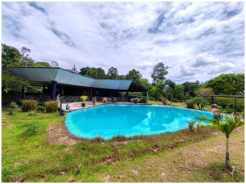 self-sufficient farm with aquaculture Costa Rica, tropical fruit orchard property Costa Rica, food production property Costa Rica,