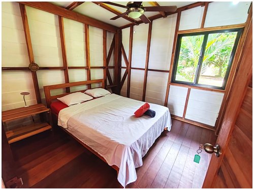 Ocean view home Cahuita, Cahuita property for sale, Costa Rica Caribbean real estate, walk to beach Costa Rica, hardwood home Costa Rica, gated community Cahuita, Costa Rica investment property, beach