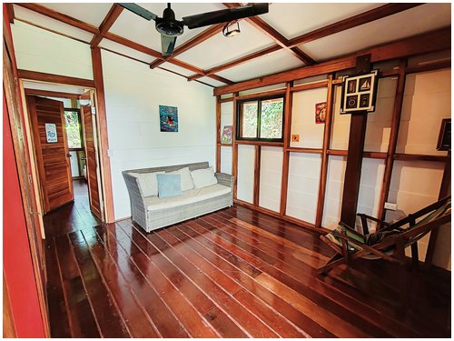 Ocean view home Cahuita, Cahuita property for sale, Costa Rica Caribbean real estate, walk to beach Costa Rica, hardwood home Costa Rica, gated community Cahuita, Costa Rica investment property, beach