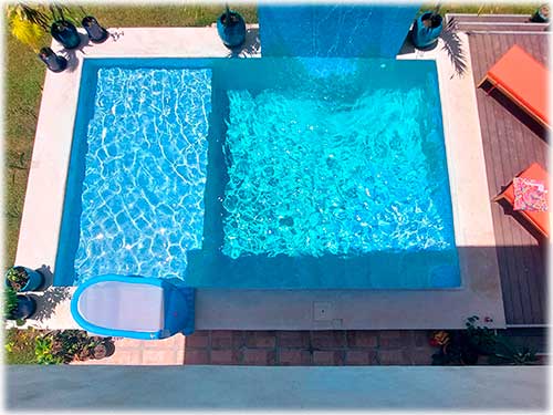 Cahuita real estate, Costa Rica Caribbean coast property, home for sale near Cahuita, Costa Rica pool home, vacation rental property Costa Rica, investment property Caribbean Costa Rica, two-story hom